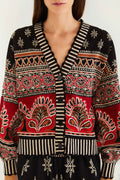 FARM Rio model wearing the Black Ainika Love Coconut Groove Knit Cardigan