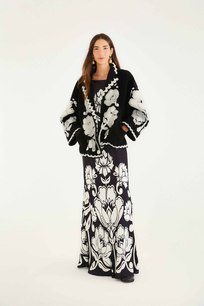 FARM Rio model wearing the Black & White Floral Arabesque Fleece Coat