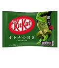 A package of Nestle Kit Kat Chocolate in Green Tea flavor, predominantly green in color with the Kit Kat logo visible.