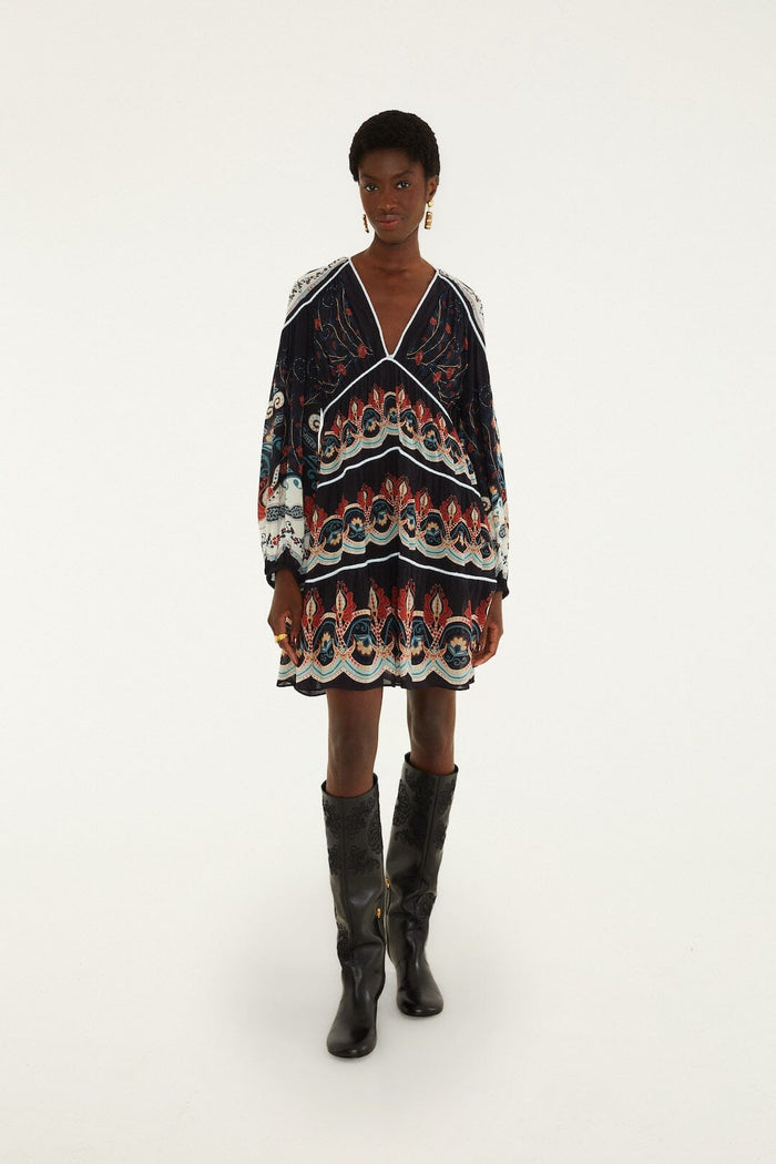 FARM Rio model wearing the Nikita Winter Black Long Sleeve Mini Dress