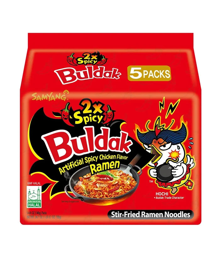 Packaging for Samyang Spicy Chicken Buldak Noodles showing the brand logo, product name, and an illustration of a bowl of noodles with chicken.
