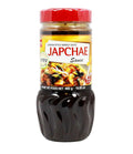 A bottle of Wang Japchae Sauce, with Korean text and branding visible, against a white background.
